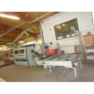Four-side moulder with grooved table and feed stat