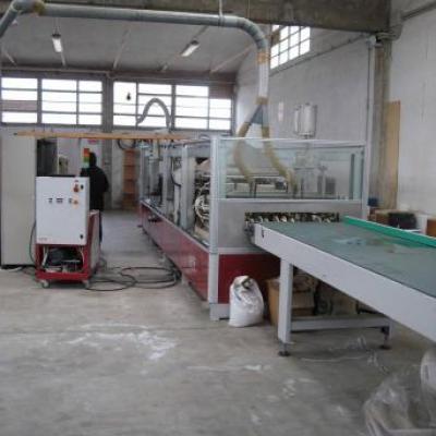 Wrapping machine for PVC profiles
