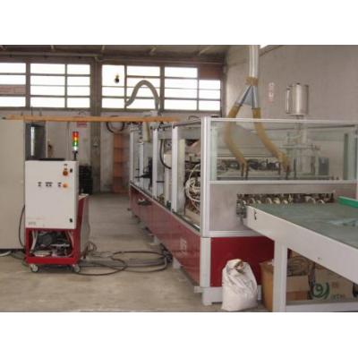 Wrapping machine for PVC profiles