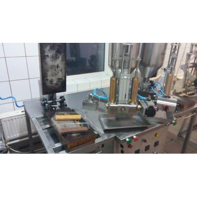 machine for the production of rolled wafers